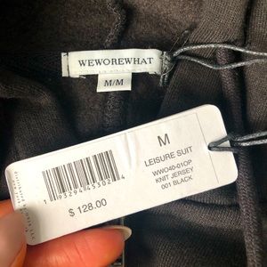 NWT WeWoreWhat leisure jumpsuit in black. Size M
